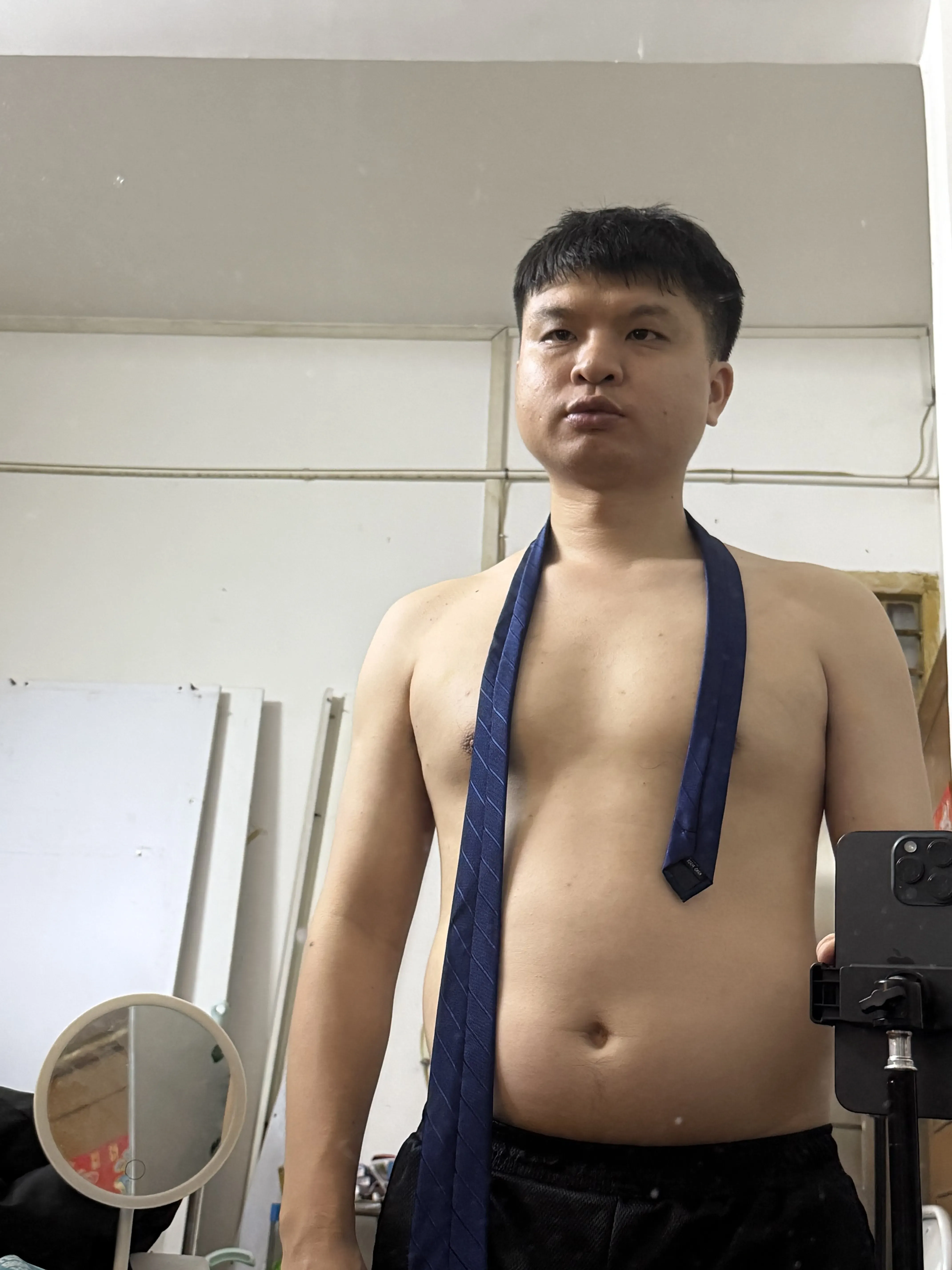 Simple Knot Step 1 - Position the Tie Around Your Neck